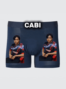 a pair of boxer shorts with a picture of a man and the word cabi on the top