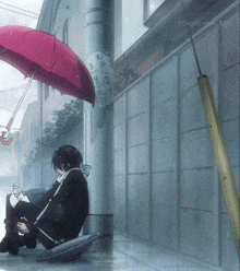 a man sits under an umbrella with tokyo mx 1 written on the bottom