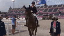 riding a horse laura collet great britain olympic team nbc olympics horseback riding