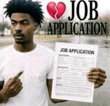 a man is holding a job application with a broken heart on it