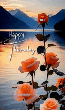 a happy thursday greeting with roses in front of a lake