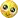 a close up of a pixelated smiley face with tears coming out of its eyes .