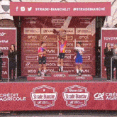 a podium with a sign that says strade bianche on it