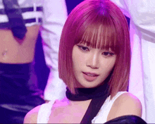 a woman with purple hair is wearing a choker and a white tank top