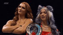 two women standing next to each other with the aew logo on the bottom