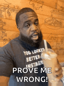 a man with a beard wearing a shirt that says " you looked better instagr "