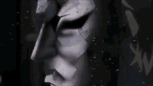 a close up of a person 's face with a broken mask on .