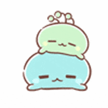 a cartoon drawing of a green worm sitting on top of another worm .