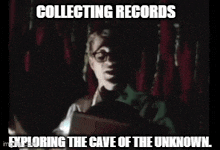 a man with glasses is holding a book in a dark room with the words collecting records exploring the cave of the unknown