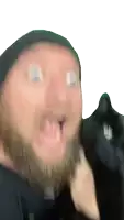 a man with a beard wearing a black hat is making a funny face