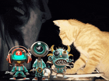 a cat is looking at a toy with the number 52 on its face