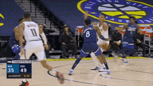a basketball game between the timberwolves and the denver nuggets