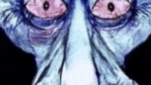 a close up of a cartoon character 's face with big eyes and a blue tie .