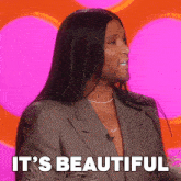 a woman with long hair and a beard says " it 's beautiful "