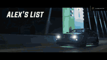 a car is driving down a street at night with alex 's list written above it