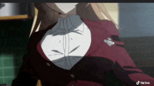 a close up of a girl 's breast with tiktok written on the bottom