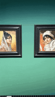 two framed paintings on a green wall one of which is of a woman wearing a hat