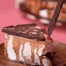 a piece of cake on a plate that says mr bake