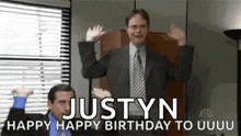 a man in a suit and tie is celebrating his birthday