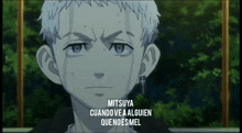 a close up of a person 's face with the words mitsuya cuando ve a alguien quenoesmel below it