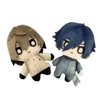 a couple of stuffed animals one of which has a tag that says " love " on it