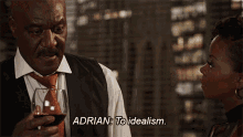 To Idealism And Pragmatism Adrian Boseman GIF - To Idealism And Pragmatism Adrian Boseman Barbara Kolstad GIFs