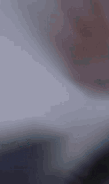 a pixel art drawing of a person 's face with a dark background