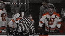 a hockey game between holy cross and rit is being played