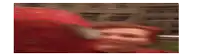 a blurry picture of a man wearing a red hat and a red jacket .