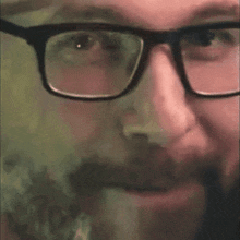 a close up of a man 's face with the words bang written on it