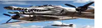 a plane that looks like a crocodile has a bomb attached to its tail