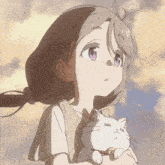 a girl with purple eyes holds a white cat