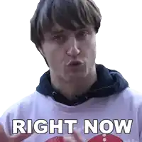 a young man wearing a white shirt that says right now