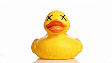 a yellow rubber duck with x 's on its eyes