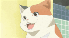 a calico cat with its mouth open and its teeth visible