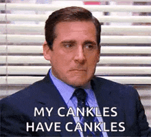 michael scott from the office says `` my cankles have cankles '' while sitting in front of a window .