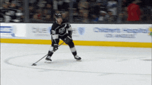 a hockey player with the number 13 on their jersey