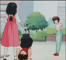 a girl in a pink dress is standing next to a boy laying on the ground .