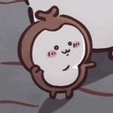 a cartoon monkey is standing next to a sheep and looking at the camera .