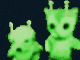 two green aliens are standing next to each other on a blue background .