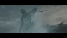 a painting of a lightning storm with a statue of a man in the foreground
