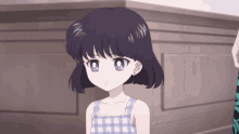 a little girl with purple hair and blue eyes