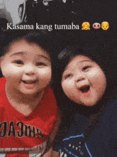 a boy and a girl are posing for a picture and the girl is wearing a shirt that says majhs