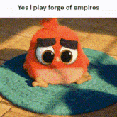 a red angry bird is sitting on a blue rug with a caption that reads yes i play forge of empires