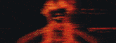 a blurred image of a person 's face with a yellow jacket on .