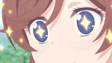 a close up of a girl 's eyes with a diamond in the center
