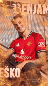a man in a red shirt with the name benjam on it