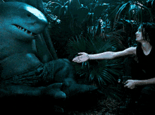 the suicide squad king shark ratcatcher2 shaking hands hand shake