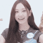 a woman wearing a name tag that says ' y ' on it