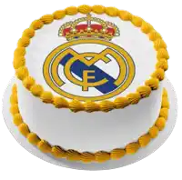 a white cake with a real madrid logo on top